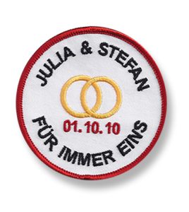 Aufnäher mit goldenen Ringen zur Hochzeit
