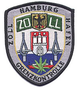 Silberner Aufhäher des Zoll in rundlicher Schild-Außenform